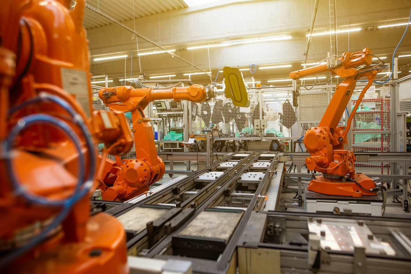 Robotic arms on a factory production line